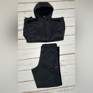 Dark gray and black zip up Nike sweat suit therma fit